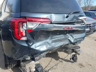2020 GMC Acadia SLE z VIN 1GKKNRLS1LZ224345, wystawiony jako IAAI lot #41730857 z przebiegiem 85 126 mil mil oraz . Historia ofert i sprzedaży dostępna na DreamBid. Obrazek 6.