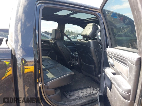 2023 Ram 1500 Laramie with VIN 1C6SRFJT6PN542105, listed as a IAAI auction lot 41974428 with 74,489 mi miles and . Bid and sale history available at DreamBid. Image 8.