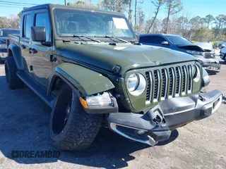 2022 Jeep Gladiator High Altitude with VIN 1C6HJTFG3NL141891, listed as a IAAI auction lot 41738578 with 38,133 mi miles and . Bid and sale history available at DreamBid. Image 6.