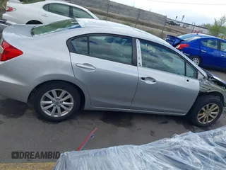 2012 Honda Civic EX with VIN 2HGFB2F81CH610374, listed as a IAAI auction lot 42019951 with 109,835 mi miles and . Bid and sale history available at DreamBid. Image 14.