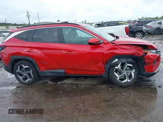 2022 Hyundai Tucson SEL with VIN 5NMJF3AE2NH115088, listed as a IAAI auction lot 41915800 with 13,120 mi miles and . Bid and sale history available at DreamBid. Image 13.
