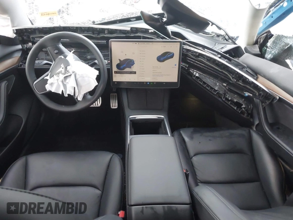 2022 Tesla Model 3 Performance with VIN 5YJ3E1EC7NF306192, listed as a IAAI auction lot 41453931 with 36,450 mi miles. Bid and sale history available at carsss.com. Image 5.