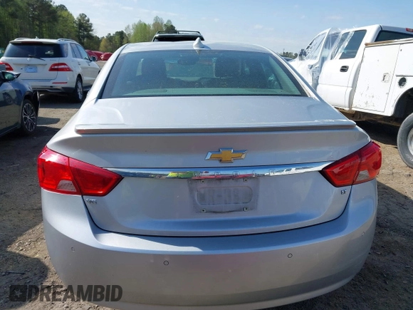2015 Chevrolet Impala LT with VIN 2G1125S35F9213472, listed as a IAAI auction lot 41924702 with 124,656 mi miles and . Bid and sale history available at DreamBid. Image 16.