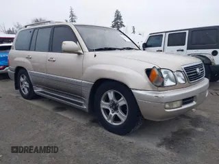 1999 Lexus LX 470 with VIN JT6HT00W4X0056023, listed as a IAAI auction lot 41319329 with 206,974 mi miles and . Bid and sale history available at DreamBid. Image 1.