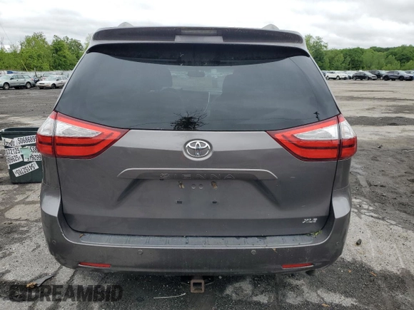 2015 Toyota Sienna XLE with VIN 5TDYK3DC4FS659692, listed as a Copart auction lot 57248355 with 121,644 mi miles and Salvage title. Bid and sale history available at DreamBid. Image 6.