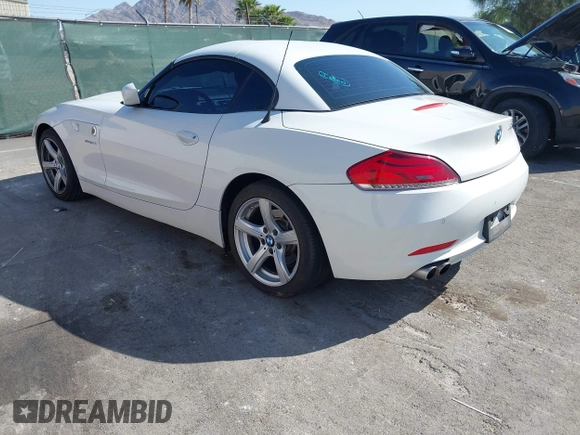 2009 BMW Z4 sDrive30i with VIN WBALM53549E161311, listed as a IAAI auction lot 41985897 with 112,997 mi miles. Bid and sale history available at carsss.com. Image 3.