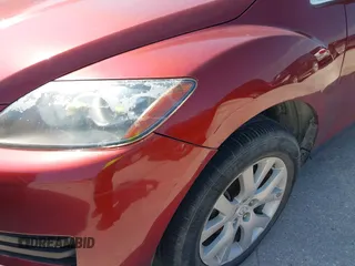 2009 Mazda CX-7 Sport with VIN JM3ER293790238291, listed as a IAAI auction lot 37414557 with 197,302 mi miles. Bid and sale history available at carsss.com. Image 6.