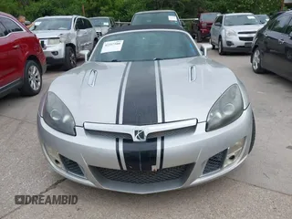 2008 Saturn Sky Red Line z VIN 1G8MG35X98Y101663, wystawiony jako IAAI lot #42357500 z przebiegiem 148 165 mil mil oraz . Historia ofert i sprzedaży dostępna na DreamBid. Obrazek 12.