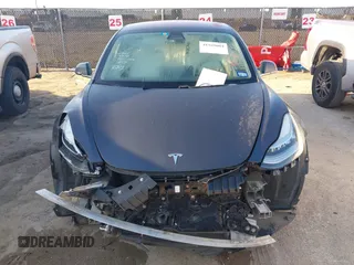 2018 Tesla Model 3 Long Range Battery with VIN 5YJ3E1EB0JF170215, listed as a IAAI auction lot 41969004 with 81,704 mi miles and . Bid and sale history available at DreamBid. Image 11.