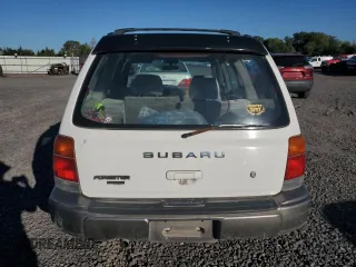 1998 Subaru Forester S with VIN JF1SF6559WH770566, listed as a Copart auction lot 74371824 with 201,681 mi miles and Salvage Title. Bid and sale history available at carsss.com. Image 6.
