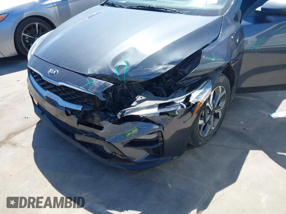 2021 Kia Forte LXS z VIN 3KPF24ADXME356322, wystawiony jako IAAI lot #42237624 z przebiegiem 52 609 mil mil oraz . Historia ofert i sprzedaży dostępna na DreamBid. Obrazek 6.