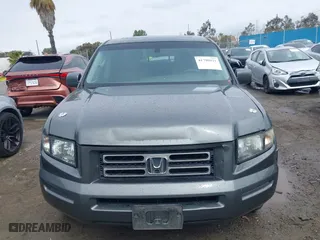 2007 Honda Ridgeline RTL w/Leather with VIN 2HJYK16537H523732, listed as a IAAI auction lot 41798931 with 219,881 mi miles. Bid and sale history available at carsss.com. Image 12.