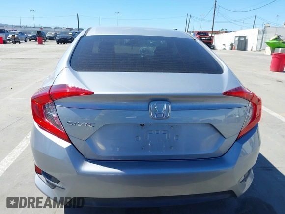 2017 Honda Civic LX z VIN 2HGFC2F5XHH572573, wystawiony jako IAAI lot #41825261 z przebiegiem 83 599 mil mil oraz . Historia ofert i sprzedaży dostępna na DreamBid. Obrazek 16.