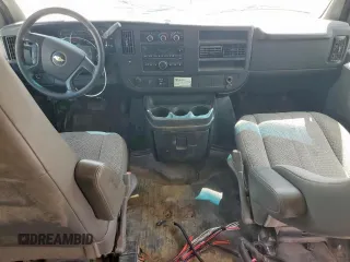 2014 Chevrolet Express Passenger LT с VIN 1GAZG1FGXE1106737, выставлен на аукционе Copart как лот 62956805 с пробегом 267 908 миль миль и Чистый • Clean title. История ставок и продаж доступна на DreamBid. Изображение 8.
