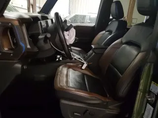2022 Ford Bronco z VIN 1FMDE5DH1NLB59322, wystawiony jako Copart lot #57809495 z przebiegiem 64 094 mil mil oraz Szkoda całkowita • Salvage title. Historia ofert i sprzedaży dostępna na DreamBid. Obrazek 7.