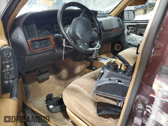 1996 Jeep Grand Cherokee Laredo with VIN 1J4GZ58Y1TC171915, listed as a Copart auction lot 50764034 with 0 mi miles and Salvage Title. Bid and sale history available at carsss.com. Image 8.