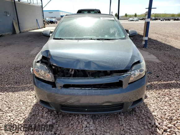 2010 Scion tC with VIN JTKDE3B70A0312506, listed as a Copart auction lot 48233795 with 134,695 mi miles and Salvage Title. Bid and sale history available at carsss.com. Image 5.