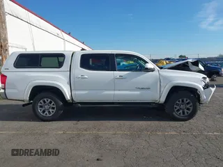 2017 Toyota Tacoma SR5 with VIN 3TMAZ5CN3HM045330, listed as a IAAI auction lot 41371012 with 20,170 mi miles and . Bid and sale history available at DreamBid. Image 14.