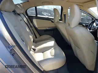 2016 Volvo S60 T5 Premier z VIN LYV612TK2GB099241, wystawiony jako IAAI lot #41808950 z przebiegiem 153 693 mil mil oraz . Historia ofert i sprzedaży dostępna na DreamBid. Obrazek 8.