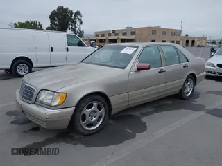 1997 Mercedes-Benz S-Class with VIN WDBGA32G1VA349367, listed as a IAAI auction lot 42079132 with 383,250 mi miles. Bid and sale history available at carsss.com. Image 6.