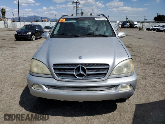 2004 Mercedes-Benz M-Class with VIN 4JGAB75EX4A470494, listed as a Copart auction lot 52024515 with 185,639 mi miles and Salvage Title. Bid and sale history available at carsss.com. Image 5.