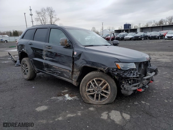 2019 Jeep Grand Cherokee Trailhawk with VIN 1C4RJFLG5KC639833, listed as a Copart auction lot 85595524 with 111,603 mi miles and Salvage Title. Bid and sale history available at carsss.com. Image 4.