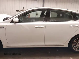 2016 Kia Optima SXL Turbo with VIN 5XXGV4L21GG073147, listed as a IAAI auction lot 41504517 with 130,467 mi miles. Bid and sale history available at carsss.com. Image 14.