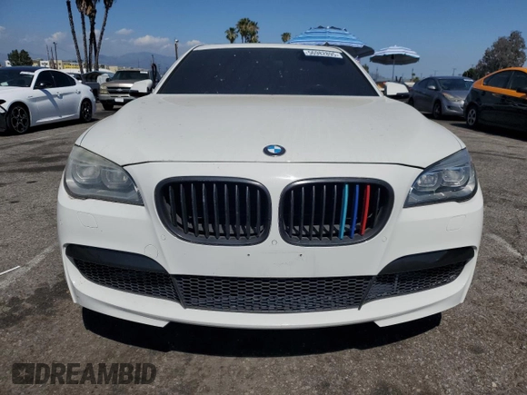 2013 BMW 7 Series 750i with VIN WBAYA8C54DC996412, listed as a Copart auction lot 56982895 with 124,258 mi miles and Salvage title. Bid and sale history available at DreamBid. Image 5.