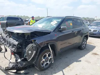 2022 Jeep Compass Trailhawk with VIN 3C4NJDDBXNT157230, listed as a IAAI auction lot 42046292 with Not provided miles and . Bid and sale history available at DreamBid. Image 2.