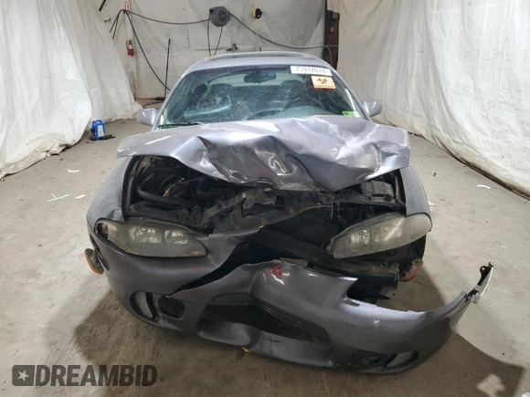 1998 Mitsubishi Eclipse with VIN 4A3AK44Y1WE117391, listed as a Copart auction lot 75937014 with 202,560 mi miles and Salvage Title. Bid and sale history available at DreamBid. Image 5.