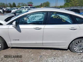 2013 Ford Fusion SE Hybrid z VIN 3FA6P0LU9DR349321, wystawiony jako IAAI lot #42156321 z przebiegiem 90 688 mil mil oraz . Historia ofert i sprzedaży dostępna na DreamBid. Obrazek 14.