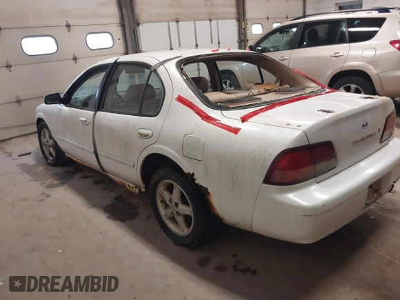 1998 Nissan Maxima GXE z VIN JN1CA21A9WM805626, wystawiony jako IAAI lot #42497316 z przebiegiem 195 991 mil mil oraz . Historia ofert i sprzedaży dostępna na DreamBid. Obrazek 3.