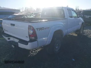 2014 Toyota Tacoma with VIN 5TFUU4EN1EX088377, listed as a IAAI auction lot 41443682 with 67,185 mi miles and . Bid and sale history available at DreamBid. Image 4.