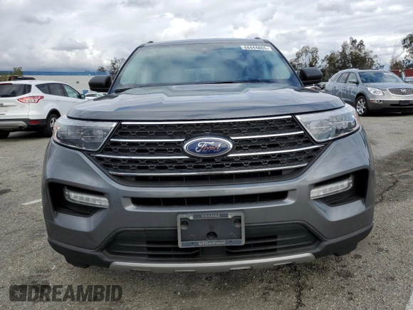 2023 Ford Explorer XLT with VIN 1FMSK7DH6PGA12033, listed as a Copart auction lot 44444865 with 27,826 mi miles and Salvage Title. Bid and sale history available at carsss.com. Image 5.