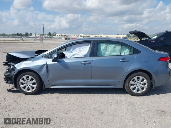 2023 Toyota Corolla Hybrid LE with VIN JTDBCMFE8PJ010693, listed as a IAAI auction lot 41736641 with 10,751 mi miles. Bid and sale history available at carsss.com. Image 15.