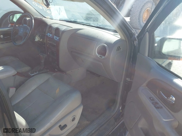2005 GMC Envoy SLE with VIN 1GKDT13S952288760, listed as a IAAI auction lot 41671656 with 1 mi miles. Bid and sale history available at carsss.com. Image 5.