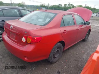 2010 Toyota Corolla with VIN 1NXBU4EE9AZ339984, listed as a IAAI auction lot 42133947 with 158,479 mi miles. Bid and sale history available at carsss.com. Image 4.