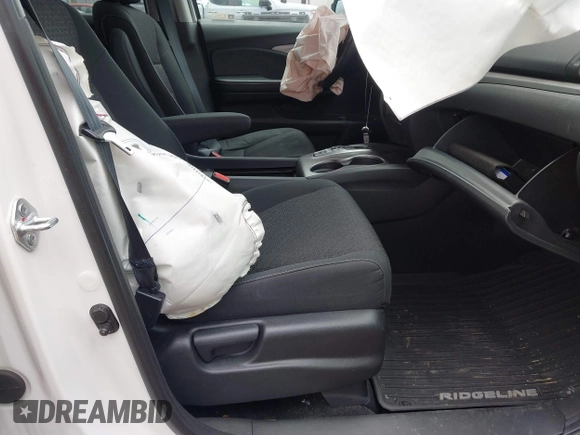 2021 Honda Ridgeline Sport with VIN 5FPYK3F14MB005117, listed as a IAAI auction lot 42343059 with 58,862 mi miles and . Bid and sale history available at DreamBid. Image 5.