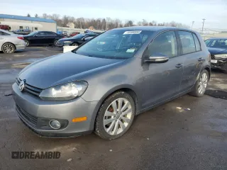 2014 Volkswagen Golf TDI w/Sunroof & Nav z VIN WVWDM7AJXEW005037, wystawiony jako Copart lot #43380895 z przebiegiem Nie podano mil oraz Czysty tytuł • Clean title. Historia ofert i sprzedaży dostępna na DreamBid. Obrazek 1.
