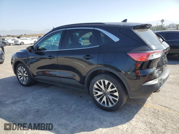 2021 Ford Escape Titanium with VIN 1FMCU9J93MUA54213, listed as a Copart auction lot 59211045 with Not provided miles and Salvage title. Bid and sale history available at DreamBid. Image 2.