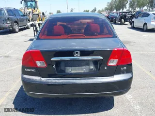 2003 Honda Civic LX with VIN JHMES16523S000517, listed as a IAAI auction lot 42012871 with 158,253 mi miles. Bid and sale history available at carsss.com. Image 16.