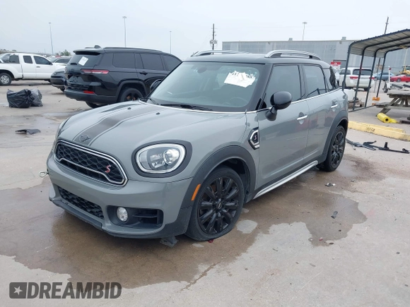 2018 MINI Countryman Cooper S z VIN WMZYT3C35J3E93291, wystawiony jako IAAI lot #41281432 z przebiegiem 58 774 mil mil oraz . Historia ofert i sprzedaży dostępna na DreamBid. Obrazek 20.