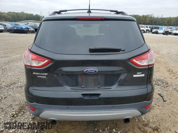 2013 Ford Escape SE z VIN 1FMCU0GX4DUB09012, wystawiony jako Copart lot #79725264 z przebiegiem 128 210 mil mil oraz Szkoda całkowita • Salvage title. Historia ofert i sprzedaży dostępna na DreamBid. Obrazek 6.