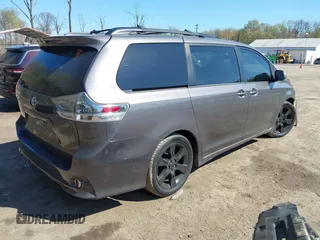 2015 Toyota Sienna SE with VIN 5TDXK3DC3FS682327, listed as a IAAI auction lot 41983156 with 141,640 mi miles. Bid and sale history available at carsss.com. Image 4.