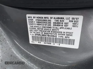 2007 Honda Odyssey EX-L z VIN 5FNRL386X7B445642, wystawiony jako IAAI lot #40652844 z przebiegiem 202 622 mil mil oraz . Historia ofert i sprzedaży dostępna na DreamBid. Obrazek 9.