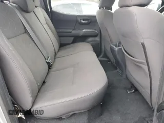 2018 Toyota Tacoma SR z VIN 3TMCZ5AN2JM122416, wystawiony jako Copart lot #50816965 z przebiegiem Nie podano mil oraz Szkoda całkowita • Salvage title. Historia ofert i sprzedaży dostępna na DreamBid. Obrazek 10.
