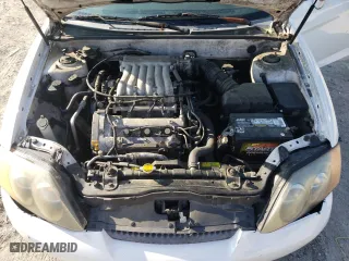 2004 Hyundai Tiburon GT with VIN KMHHN65F84U149299, listed as a Copart auction lot 73946344 with 186,198 mi miles and Non Repairable. Bid and sale history available at carsss.com. Image 11.