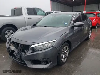 2018 Honda Civic Sedan LX with VIN 2HGFC2F59JH563823, listed as a IAAI auction lot 41449869 with 106,572 mi miles. Bid and sale history available at carsss.com. Image 20.
