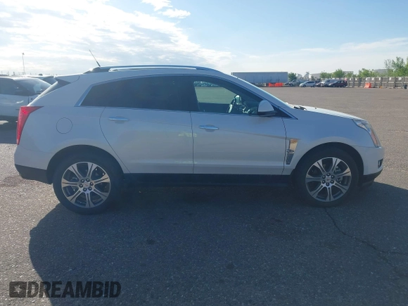 2012 Cadillac SRX Performance Collection z VIN 3GYFNEE30CS652829, wystawiony jako IAAI lot #42156961 z przebiegiem 106 473 mil mil oraz . Historia ofert i sprzedaży dostępna na DreamBid. Obrazek 13.