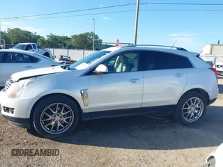 2013 Cadillac SRX Premium Collection with VIN 3GYFNJE32DS644094, listed as a IAAI auction lot 42513106 with 122,572 mi miles and . Bid and sale history available at DreamBid. Image 14.